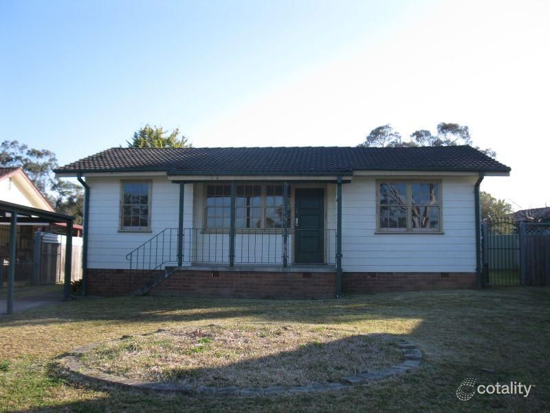 69 Grevillea Cres, Macquarie Fields, NSW 2564