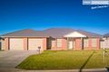 Property photo of 18 Womboin Crescent Glenfield Park NSW 2650