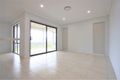 Property photo of 52 Commissioners Drive Denham Court NSW 2565