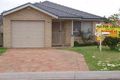 Property photo of 32 Norman Dunlop Crescent Minto NSW 2566