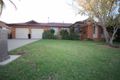 Property photo of 4 Kirrang Avenue Glenfield Park NSW 2650