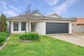Property photo of 13 Womboin Crescent Glenfield Park NSW 2650