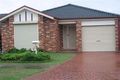Property photo of 11 Wombeyan Court Wattle Grove NSW 2173