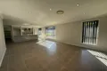 Property photo of 21 Hooghly Avenue Cameron Park NSW 2285