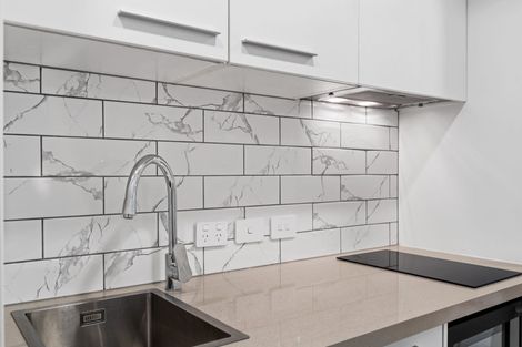 Photo of property in Alpha Apartments, 602/17 Vogel Lane, Auckland Central, Auckland, 1010