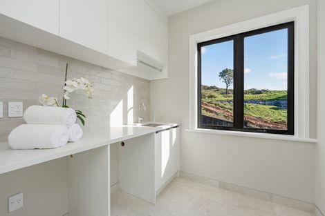 Photo of property in 9 Halcyon Bay Lane, Wainui, 0992
