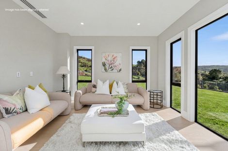 Photo of property in 9 Halcyon Bay Lane, Wainui, 0992