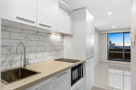 Photo of property in Alpha Apartments, 602/17 Vogel Lane, Auckland Central, Auckland, 1010