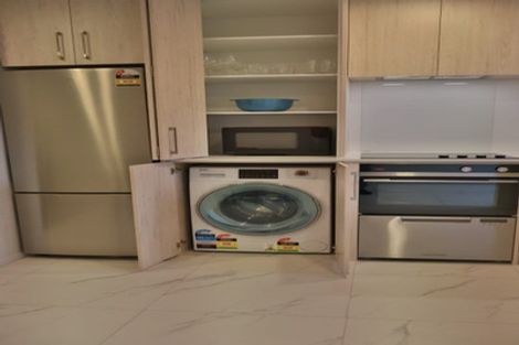 Photo of property in 2/23 Awaroa Road, Sunnyvale, Auckland, 0612