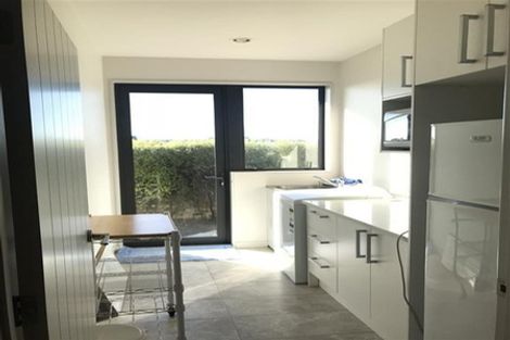 Photo of property in 882 East Coast Road, Northcross, Auckland, 0630