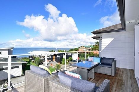 Photo of property in 1051a Whangaparaoa Road, Tindalls Beach, Whangaparaoa, 0930