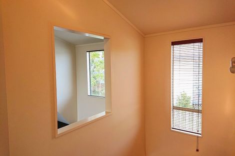Photo of property in 2/12 Grenadine Place, Unsworth Heights, Auckland, 0632