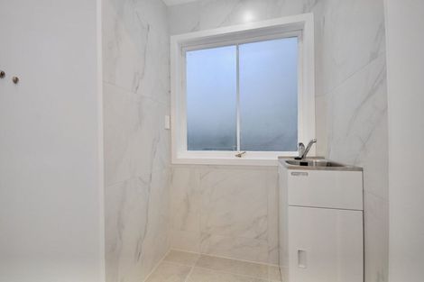 Photo of property in 2/13 Castor Bay Road, Castor Bay, Auckland, 0620