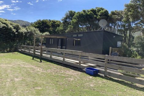 Photo of property in 1/1100a Coast Road, Wainuiomata Coast, Lower Hutt, 5373