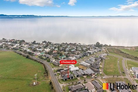 Photo of property in 2 Poutawa Lane, Clarks Beach, 2122