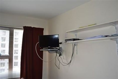 Photo of property in Orange Apartments/victoria Centr, 705/169 The Terrace, Wellington Central, Wellington, 6011