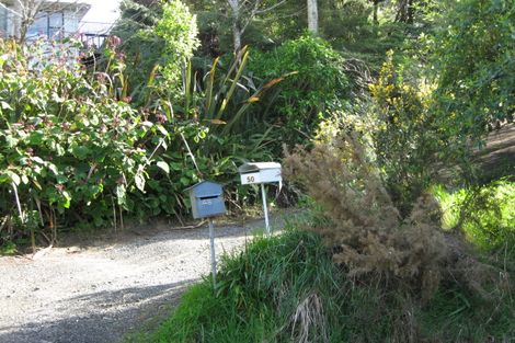 Photo of property in 50 Rauhuia Crescent, Parau, Auckland, 0604