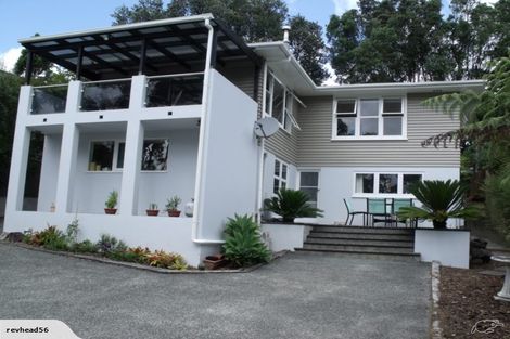 Photo of property in 97 Takahe Road, Titirangi, Auckland, 0604