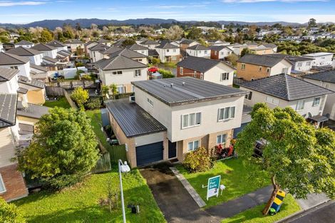 Photo of property in 65 Brashier Circle, Sunnyvale, Auckland, 0612