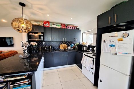 Photo of property in 2/1 Simon Ellice Drive, Bayview, Auckland, 0629