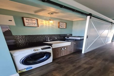 Photo of property in 1047 Whangaparaoa Road, Tindalls Beach, Whangaparaoa, 0930