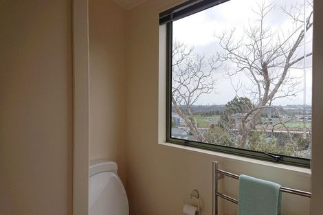 Photo of property in 2/12 Grenadine Place, Unsworth Heights, Auckland, 0632