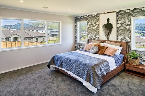 Photo of property in 113 Queen Charlotte Drive, Aotea, Porirua, 5024