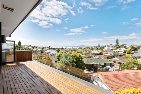 Photo of property in 73 East Coast Road, Castor Bay, Auckland, 0620