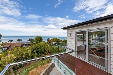 Photo of property in 1053b Whangaparaoa Road, Tindalls Beach, Whangaparaoa, 0930