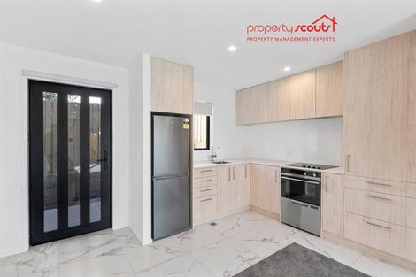 Photo of property in 1/80 Awaroa Road, Sunnyvale, Auckland, 0612
