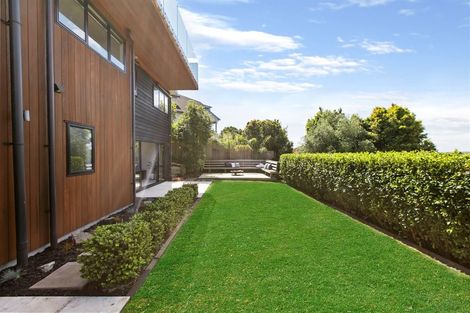 Photo of property in 73 East Coast Road, Castor Bay, Auckland, 0620