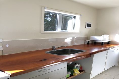 Photo of property in 903 West Coast Road, Waiatarua, Auckland, 0604