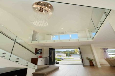 Photo of property in 39 Harrowglen Drive, Northcross, Auckland, 0632