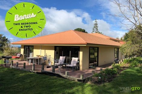 Photo of property in 1121a Whangaparaoa Road, Tindalls Beach, Whangaparaoa, 0930