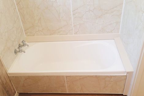 Photo of property in 1/64 Hogans Road, Glenfield, Auckland, 0629