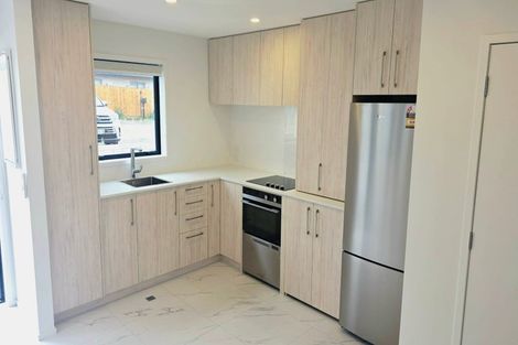 Photo of property in 1/23 Awaroa Road, Sunnyvale, Auckland, 0612