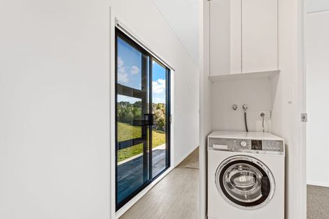 Photo of property in 1119a Whangaparaoa Road, Tindalls Beach, Whangaparaoa, 0930
