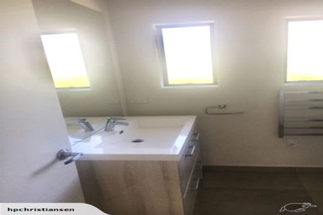 Photo of property in 1/73 Rosedale Road, Pinehill, Auckland, 0632