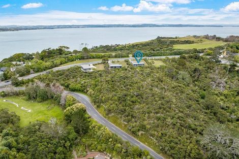 Photo of property in 1119a Whangaparaoa Road, Tindalls Beach, Whangaparaoa, 0930