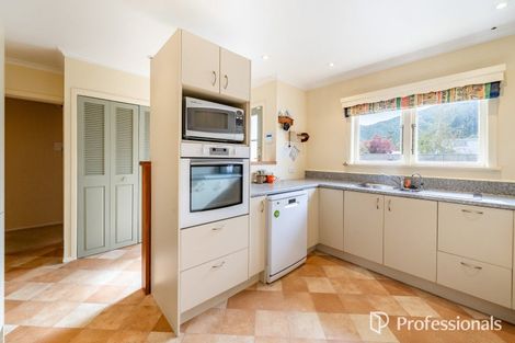 Photo of property in 4 Miles Crescent, Wainuiomata, Lower Hutt, 5014