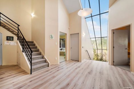 Photo of property in 1 Stitchbird Close, Murrays Bay, Auckland, 0630