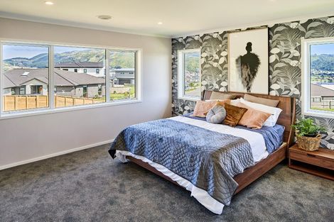 Photo of property in 113 Queen Charlotte Drive, Aotea, Porirua, 5024