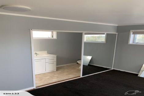 Photo of property in 2/65 Cliff View Drive, Green Bay, Auckland, 0604