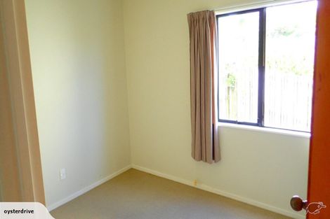 Photo of property in 1/6 Grenadine Place, Unsworth Heights, Auckland, 0632