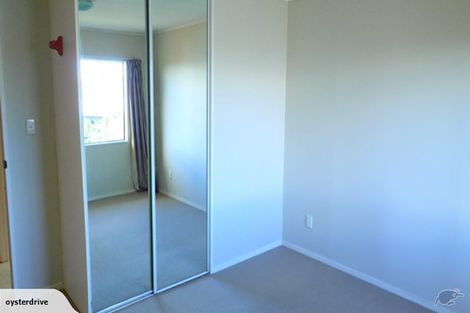 Photo of property in 1/6 Grenadine Place, Unsworth Heights, Auckland, 0632