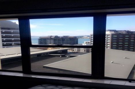 Photo of property in Orange Apartments/victoria Centr, 703/169 The Terrace, Wellington Central, Wellington, 6011