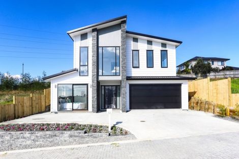Photo of property in 21 Merv Clarke Lane, Massey, Auckland, 0614