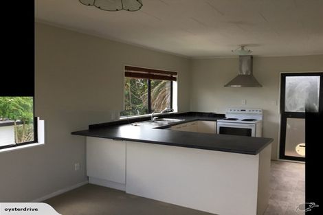 Photo of property in 1/6 Grenadine Place, Unsworth Heights, Auckland, 0632