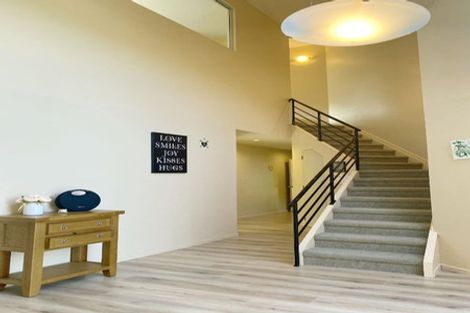 Photo of property in 1 Stitchbird Close, Murrays Bay, Auckland, 0630