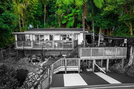 Photo of property in 894 West Coast Road, Waiatarua, Auckland, 0604